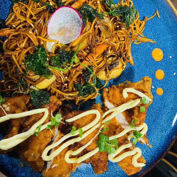 Fried Noodles with Crispy Chicken served at Who’s Café.  
